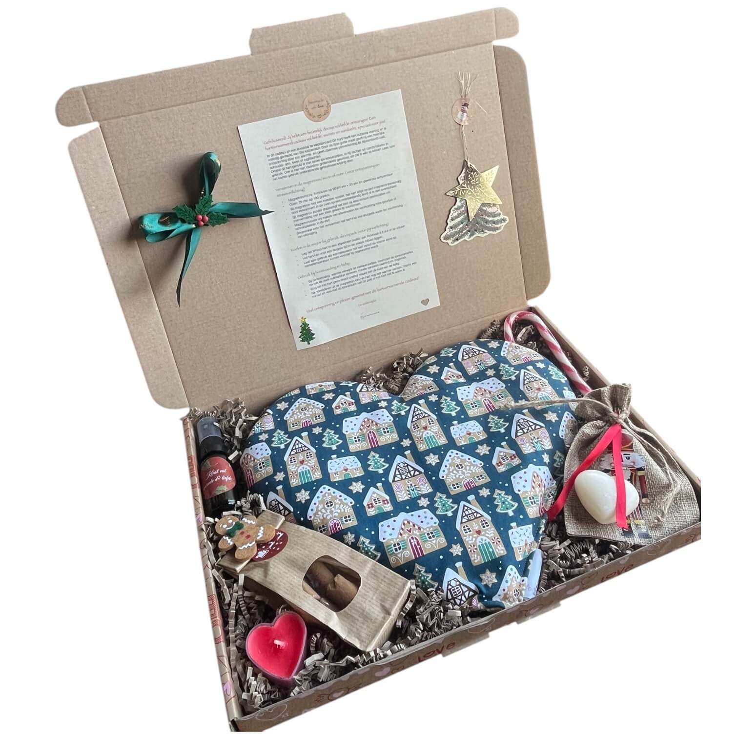 Feestelijk kerstcadeau. Met een handgemaakt verwarmbaar hart en snoepjes
